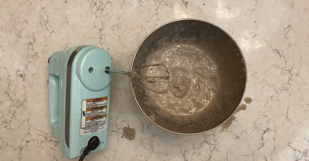 making pottery slip in mixer bowl